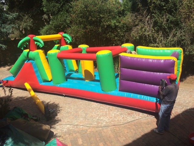 Tropical Gladiator Jumping Castle